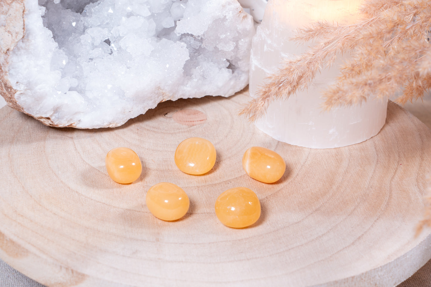 Orangencalcit Trommelsteine